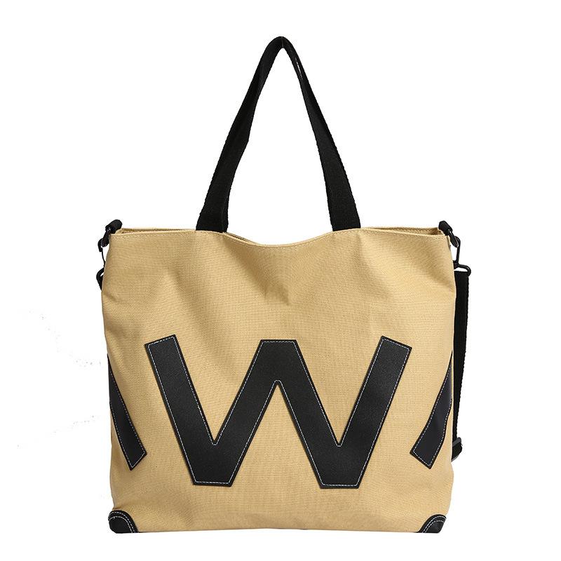 

Canvas bags, commuter bags, tote bags, women s large-capacity contrasting colors, college students, school bags, oblique span bags, popular trend жёлтый