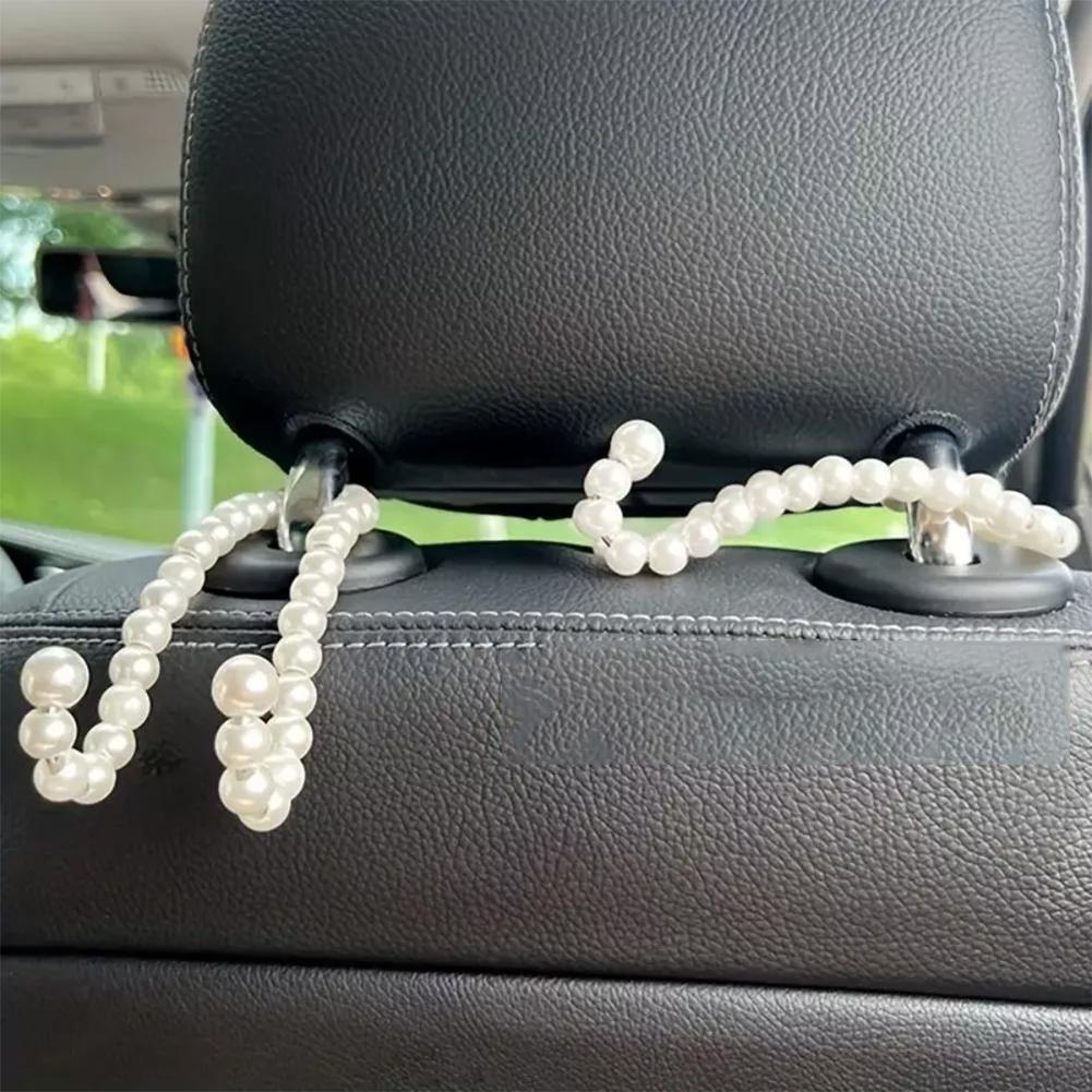 Háček na zadní sedadlo auta Bílá perleťová věšák Háček na auto Háček na auto Polootevřený design Hák na auto z nerezové oceli Háček na opěrku hlavy autosedačky Příslušenství do auta