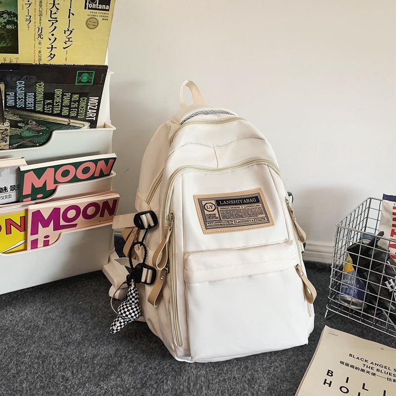 Backpack female new college student simple travel computer backpack high school junior high school student large capacity schoolbag male