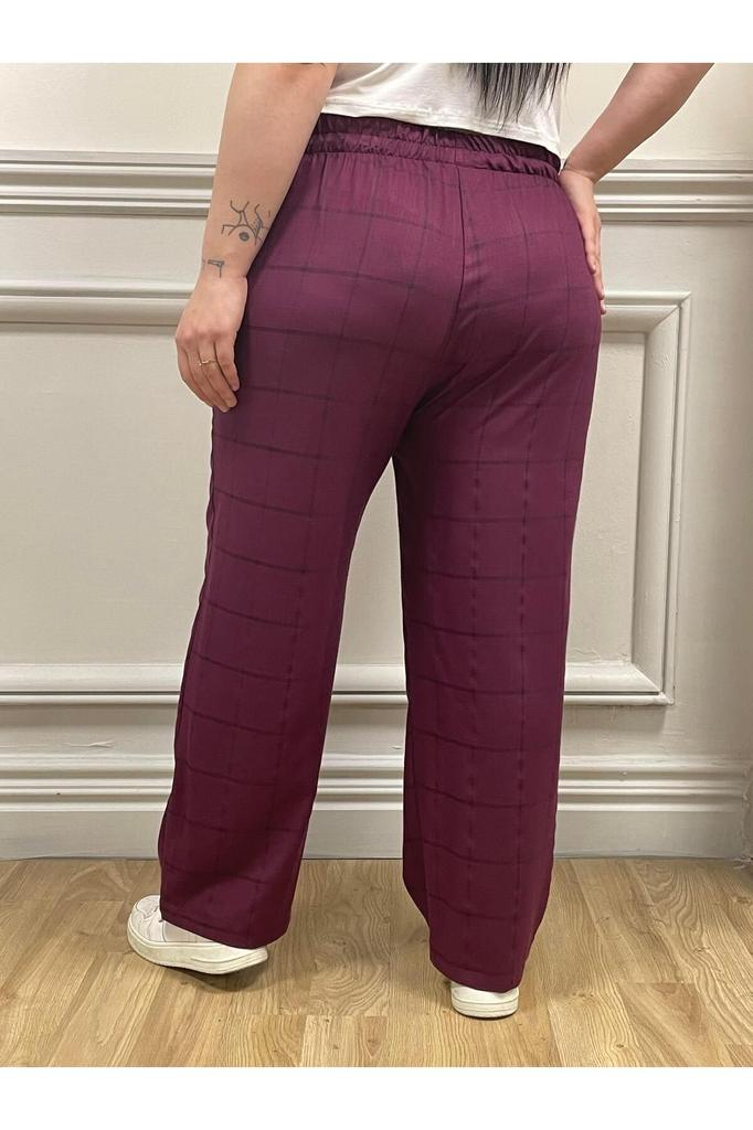 Spodnie damskie w dużych rozmiarach. Duże, bordowe spodnie w kratę z elastyczną talią