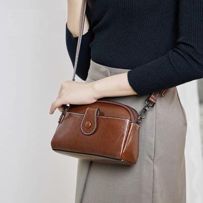 2025 Neue Mode Damen Mini Handtasche aus echtem Leder, Umhänge-Handytasche für Mütter.
