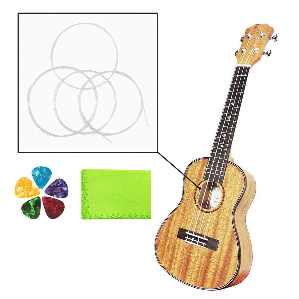 Ukulele String Clear Nylon 3 Full Set 5 Pieces Ukulele Guitar Pick and 1 Piece Green Cleaning Cloth