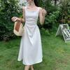 Fashion waist fold design suspender dress women's early spring Korean version fashion solid color high-end medium and long skirt
