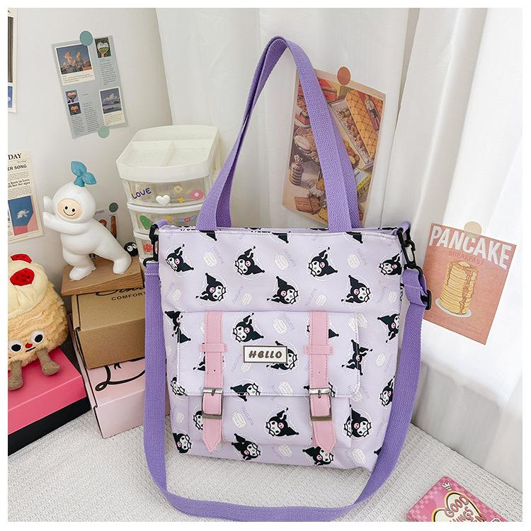 

New bag primary school students cute cartoon shoulder bag girls casual versatile foreign style tutoring bag фіолетовий