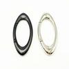 Oval Keychain Bag Pendant with Zinc Alloy Carabiner and Metal Spring Ring Accessory
