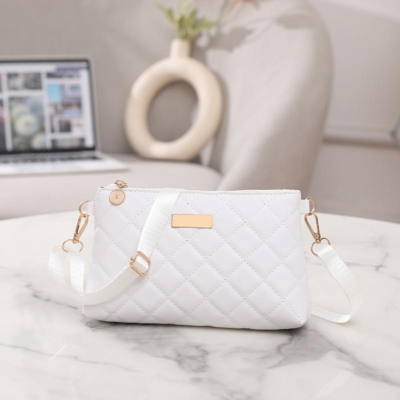 Women's bag, new embroidered iron sheet shoulder small square bag, rhombus casual messenger mobile phone bag, one piece.