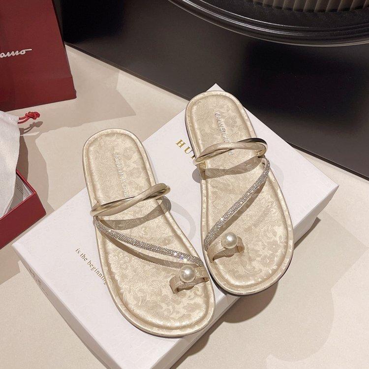 

New Chinese rhinestone pearl set toe slippers female summer wear 2024 new fairy style with skirt flat bottom cool slippers 40 абрикосовий