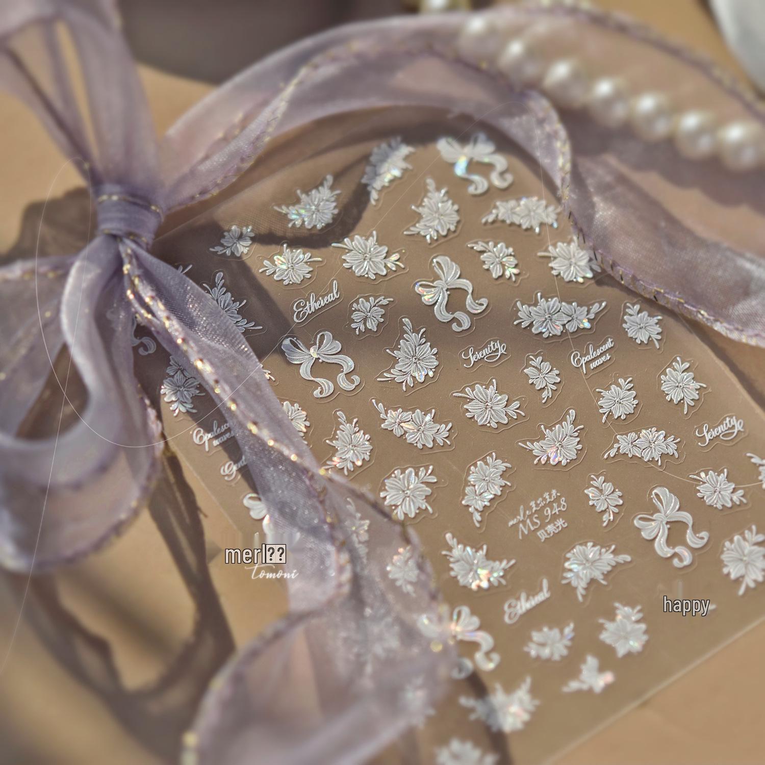

Tomoni & Moshi Seashell Solid Color Nail Art Stickers with Bow Ornament.