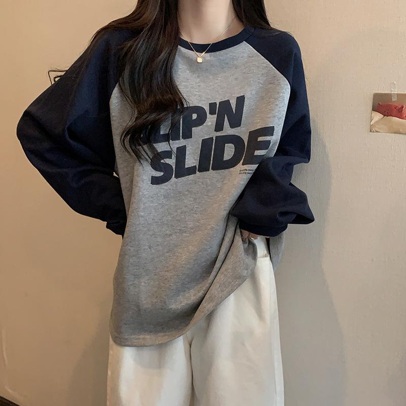 

Autumn and winter thickened polished contrasting color shoulder sleeves letter printed T-shirt women s lazy loose large version casual crew neck XL Темно-синій