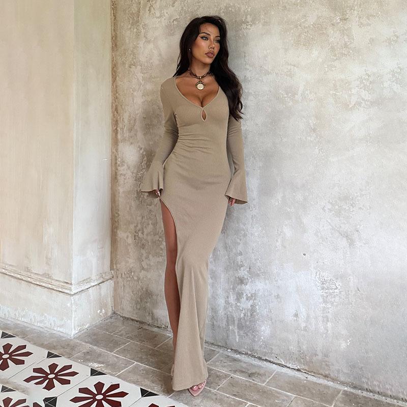 Knitted long-sleeved sexy hollow-cut dress for women ins European and American vacation style Spice Girl slim dress