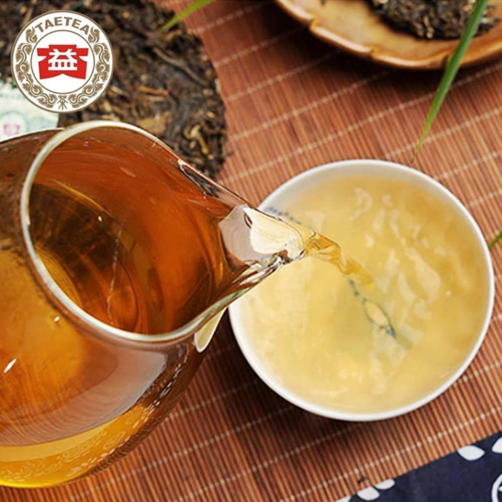 150g TAETEA 7542 Syrový koláč Puer Dayi Menghai Sheng Pu-erh
