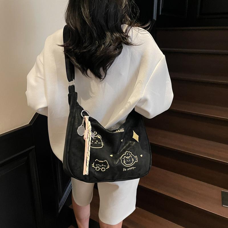 2025 new Korean version of casual niche design tote bag, student class commute fashion soft leather shoulder messenger bag
