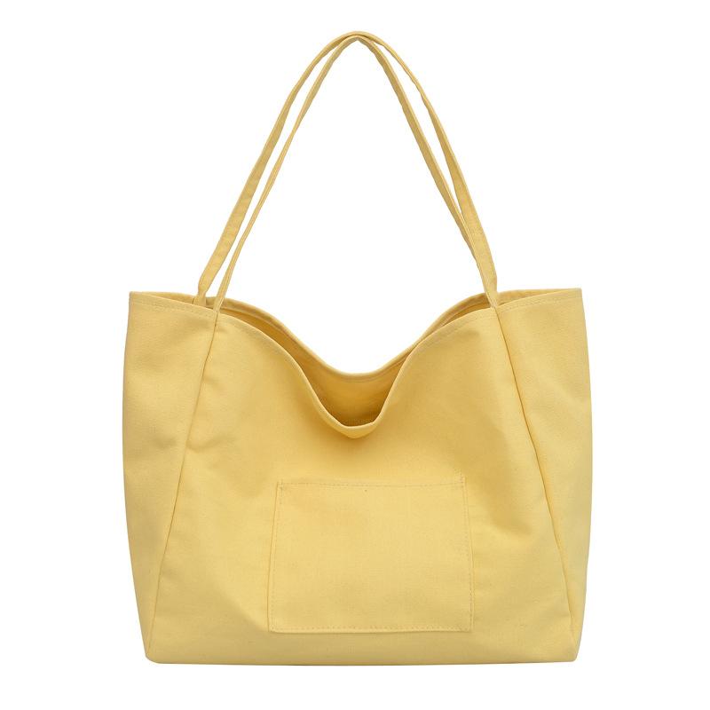 

Корейська версія в новій повсякденній полотняній сумці через плече великої місткості, жіночій портативній однотонній сумці з текстурою жовтий