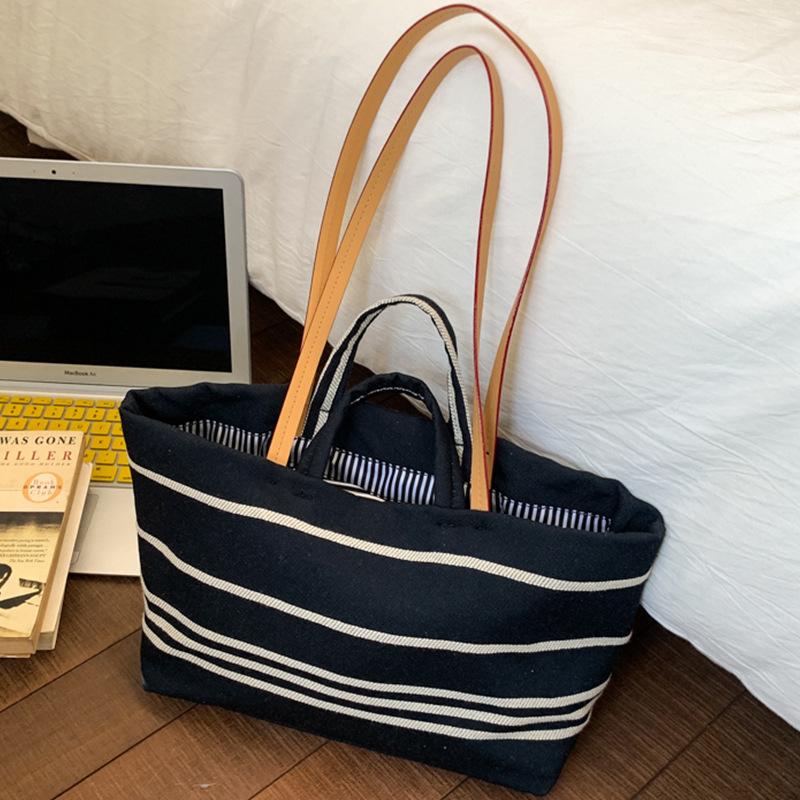 

2025 canvas tote bag women s large-capacity contrasting stripes leisure vacation beach bag portable shoulder commuter bag синий