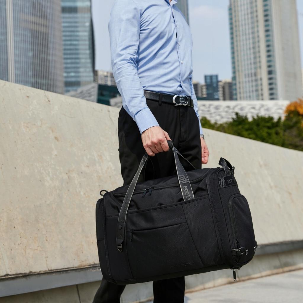Black 2-in-1 Travel Bag, Transformable Pouch and Spacious Bag 30 L, Waterproof. Arctic Hunter Lx00021 Black.