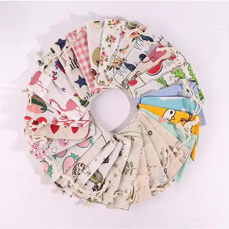 

10pcs Cartoon Printing Multicolor Natural Cotton linen Wedding Children s Travel Supplies Cosmetic Sundries Storage gift Bags 10x14cm Printed bag