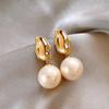 Silver Needle French Retro Pearl Pendant Earrings: Simple, Fashionable Studs with a Light Luxury Feel for Women