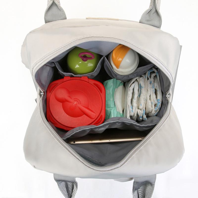 Portable Folding Diaper Bag: Large Capacity Shoulder Bag for Travel, Stroller Hanging, with Baby Bottle Holder and Changing Pad