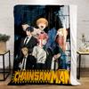 A group of characters in suits with a large chainsaw figure behind them. for all seasons blanket lunch break throw gift