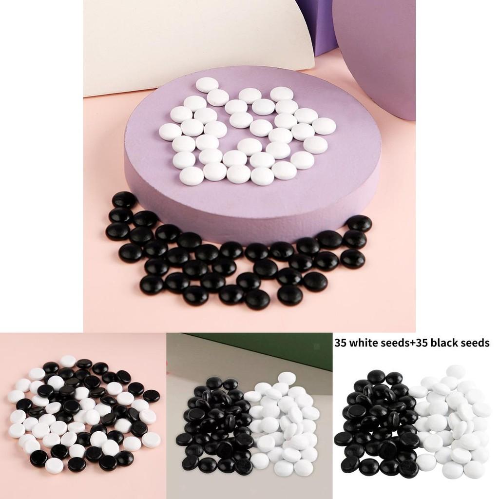 Elegant Black And White Wooden Game Pieces For Versatile Chess And Go Gameplay