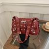 New shoulder messenger bag texture trendy cool spice girl rivet personalized design locomotive fashionable underarm baguette bag