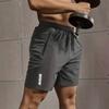 Herren Schwarz Schnelltrocknende Trainingsshorts mit Reißverschlusstasche Kordelzug Taille Sportliche Fitnessshorts