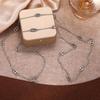 Versatile Light Luxury Titanium Steel Women's Necklace with OT Buckle - Long Chain Pig Nose Design Temperament Accessory.