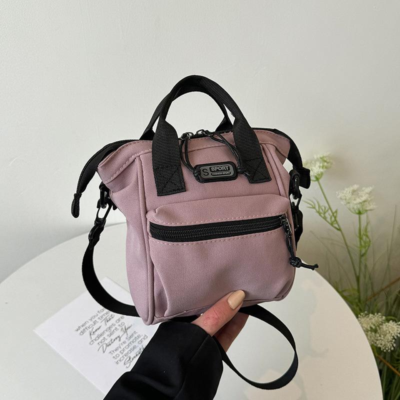 

Полотняна сумка жіноча весна 2024 новий модний модний рюкзак жіноча сумка через плече повсякденна універсальна жіноча сумка-мессенджер фіолетовий