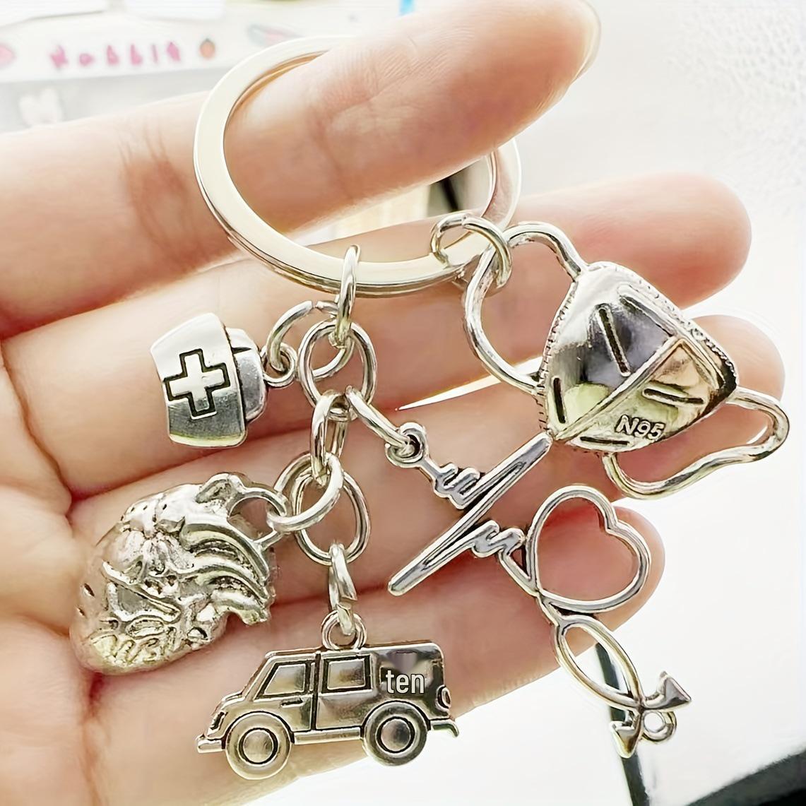 

Ambulance Heartbeat Stethoscope Keychain Pendant Gift срібний