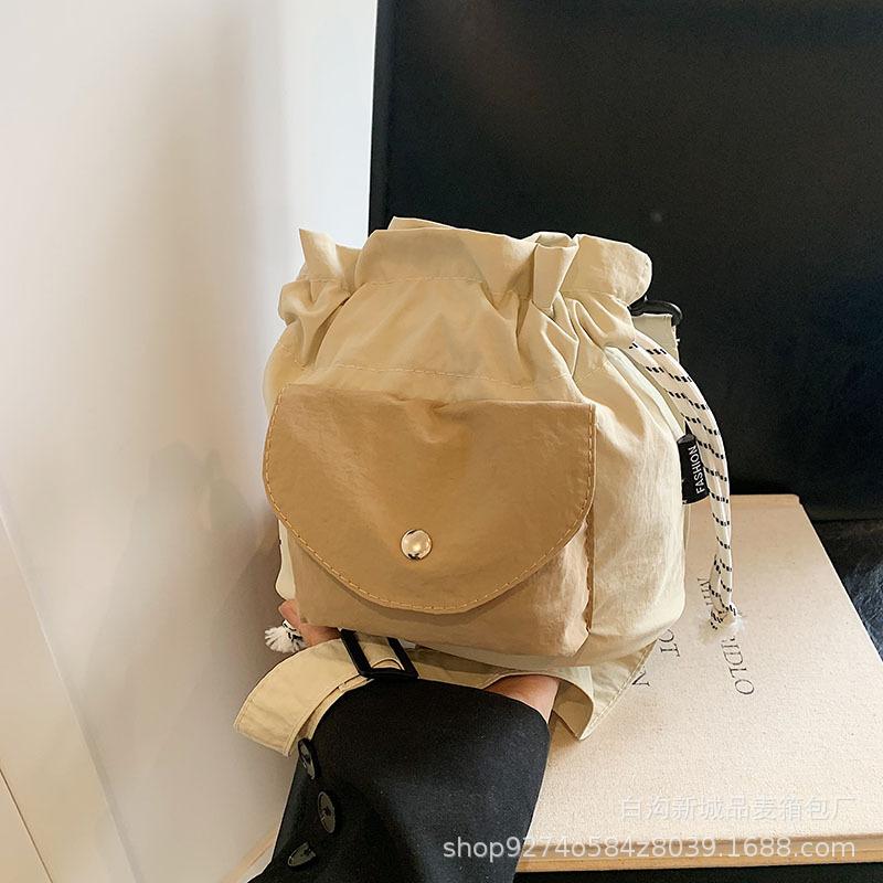 

Popular contrasting color small bag women s 2025 new trendy fashion canvas bag niche design contrasting color messenger bag