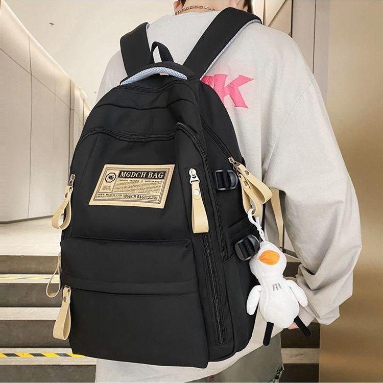 Schoolbag Multi-layer spine protection schoolbag Large capacity retro backpack 1011 New junior high school student high school student going out