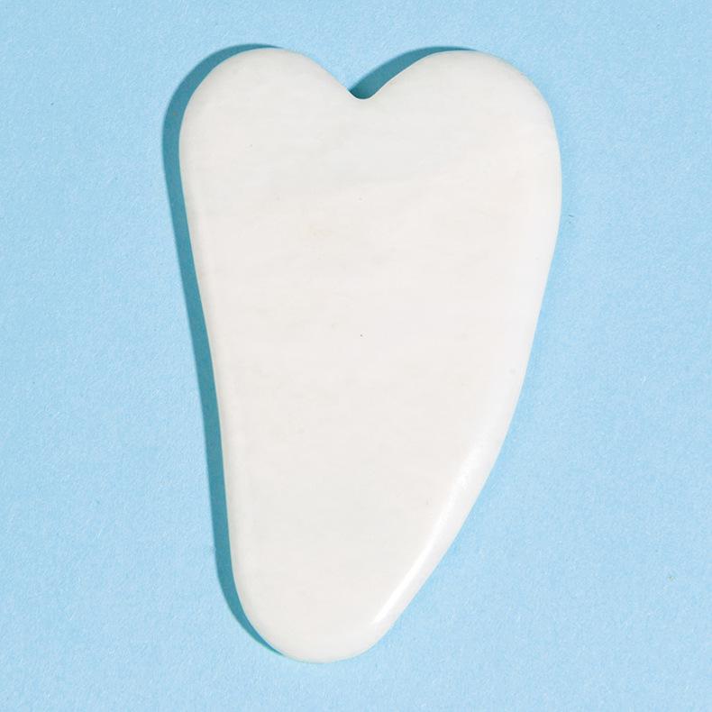 

Heart-shaped White Jade Gua Sha Facial & Body Massager