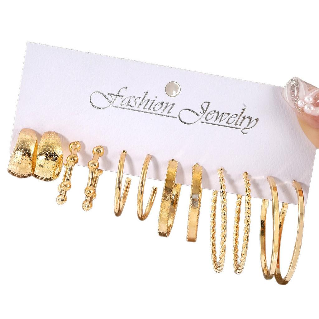 European and American new earrings set 1 pair of golden metal twist pearls creative retro simple and versatile earrings