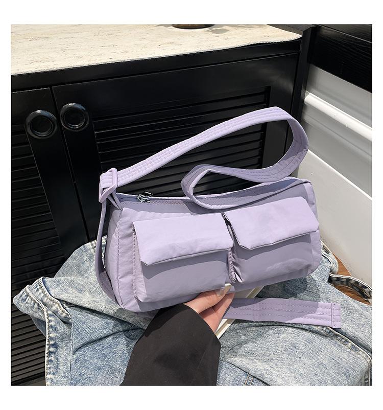 

2025 new simple bag shoulder handbag cute exquisite messenger bag niche messenger commuter shoulder bag фиолетовый