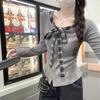 Design sense Chic bow lace-up long-sleeved T-shirt women's autumn new Korean plaid splicing fake two-piece top