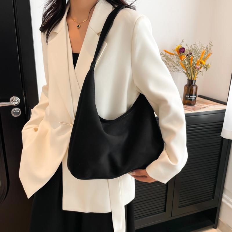 Large Capacity Niche Casual Commuter Tote Bag 2025 New Fashion Personalized Armpit Bag Retro Simple Shoulder Women's Bag