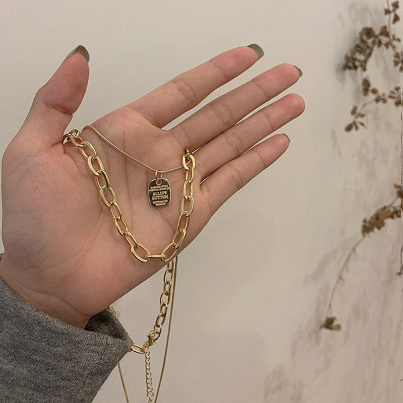 Hollow water drop pendant necklace female versatile does not fade cold wind temperament sweater chain minimalist personality niche accessories