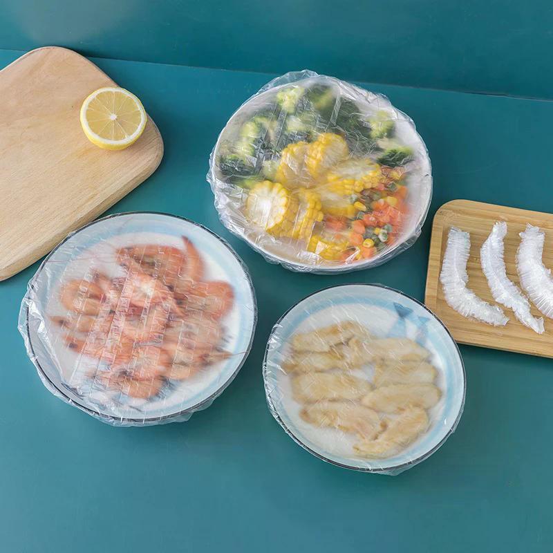 Herbruikbare wegwerpvoedselafdekking Plastic folie Duurzame elastische voedseldeksels voor kommen Elastische plaatafdekkingen voor keukenvoedselbesparende tas
