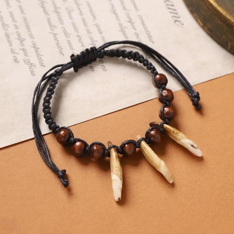 Retro Tibetan braided dog tooth bracelet handmade exotic personalized hand rope niche stacked wear men's and women's accessories