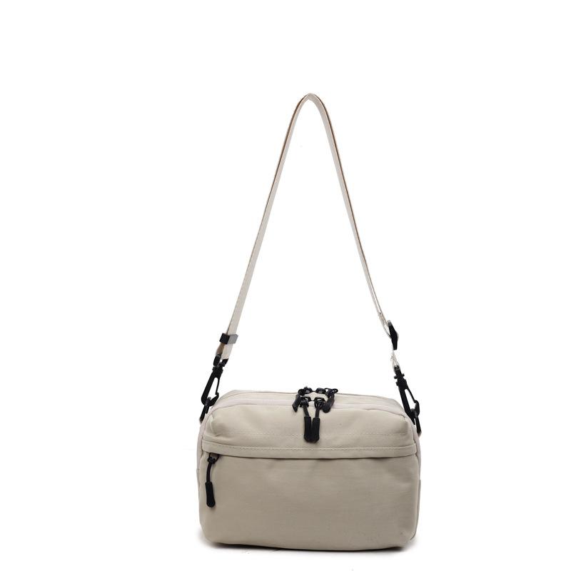 Mobile phone bag simple trend 2025 summer new Japanese lightweight shoulder small backpack women's leisure sports messenger bag