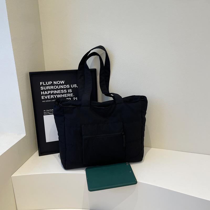 

New large-capacity bag, high-end feeling hand carry shoulder cotton bag, simple commuter tote bag, women s bag. чёрный