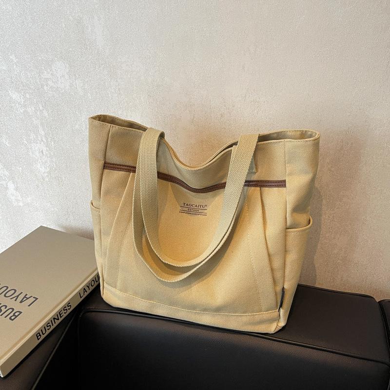 New Commuter Canvas Bag Women's Korean Ins Large-capacity Portable Tote Bag Literature and Art Student Shoulder Bag