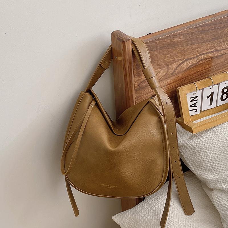 

Women s large-capacity urban simple fashion shoulder messenger bag retro tote bag світло-коричневого кольору