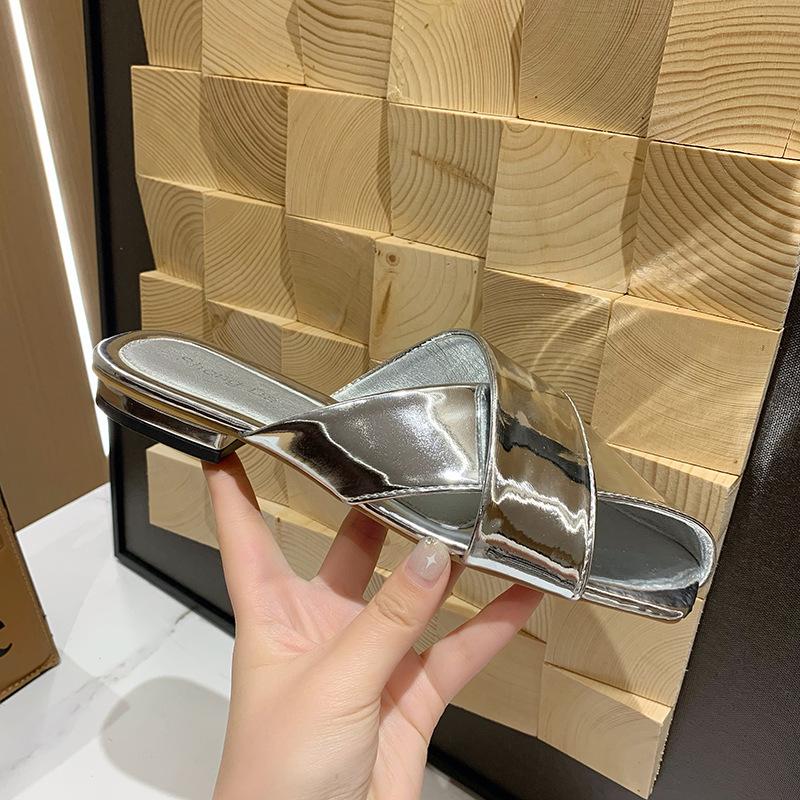 Silver low-heeled baotou half slippers summer wear New Year's new niche beach woven open-toed cool slippers