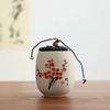 Portable Sealed Ceramic Tea Jar – Pottery Storage Canister with Plum, Orchid, Bamboo & Chrysanthemum Design
