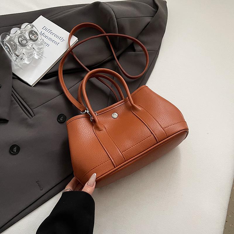 Casual hand bucket bag women's 2025 new fashion versatile shoulder bag high-end messenger women's bag
