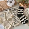 Women's Japanese Style Striped Cartoon Puppy Mid-Calf Cotton Socks - Cute, Breathable, and Versatile Embroidery Design.