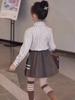 Girls' 2025 British Style Three-Piece Set: Mid-Length Trench Coat, Pleated Skirt, and Jacket for Spring/Autumn - New College Fashion.
