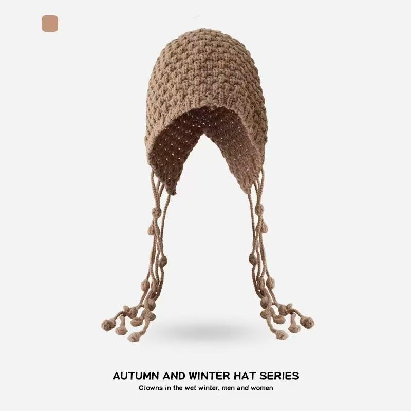 Autumn and winter warm wool hat, hand-woven hollow bag hat, women's ethnic style fringed ear protector, knitted hat