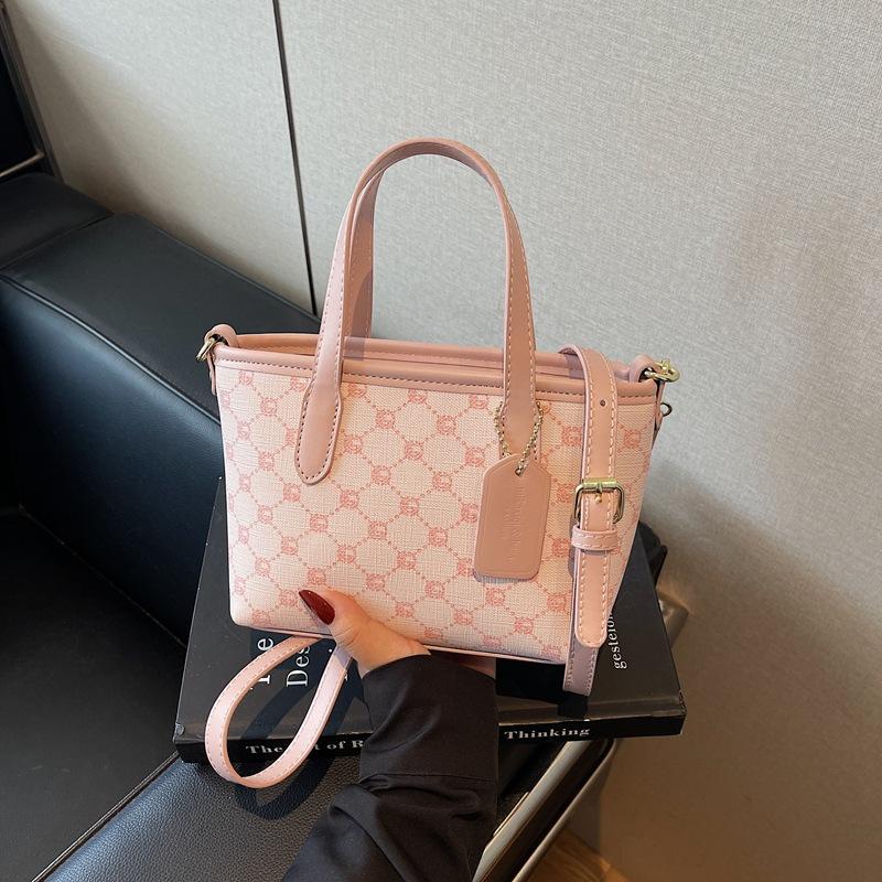 

Сегодняшняя популярная портативная маленькая сумка женская новая модная сумка-ведро через плечо универсальная сумка-мессенджер для поездок на работу розовый